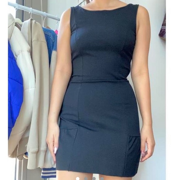 Juicy Couture Dresses & Skirts - Juicy Couture black mini dress with bow in the back.